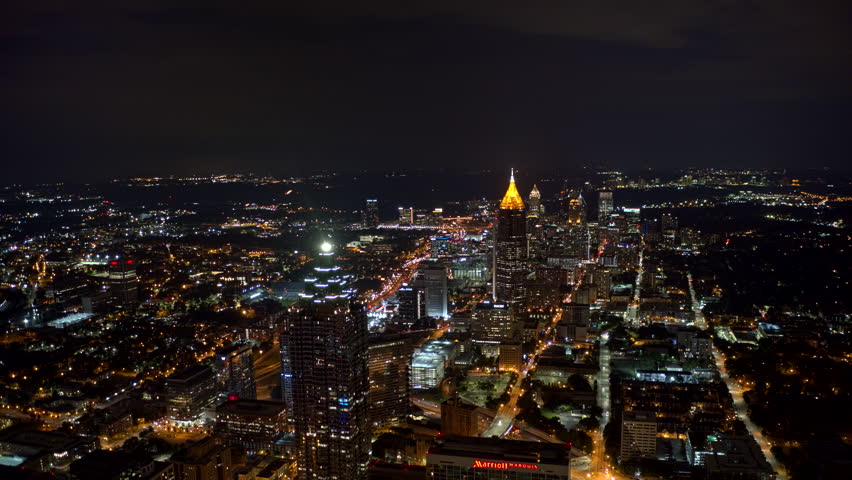 Atlanta Aerial Night hyperlapse of downtown, moving over and around freeway traffic 9/18