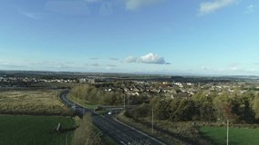 Aerial footage over the town of Whitburn in West Lothian, Scotland.