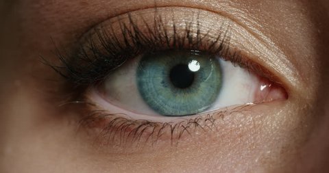 close up beautiful blue eye opening human iris macro natural beauty