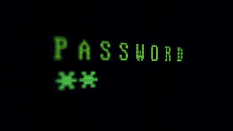 Access Denied - Cyber security and Hacking Concept. Closeup of a computer monitor while someone trying every combination to guess the password. Black screen with green and red text