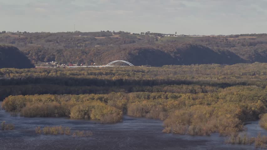 A Telephoto Daytime Shot of the Marquette-Joliet Bridge Spanning the Mississippi River Connecting Minnesota and Wisconsin shot from Wyalusing State Park 4K Timelapse