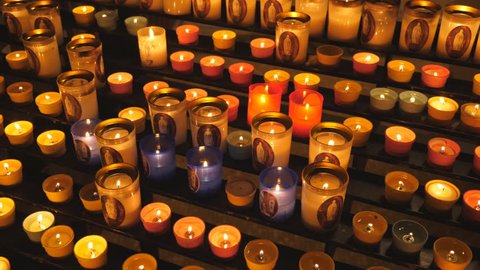 LOURDES, FRANCE on September 13th: Votive candles in the Rosary Basilica at the Sanctuary of Our Lady of Lourdes, Lourdes France on Sept 13th, 2018. 