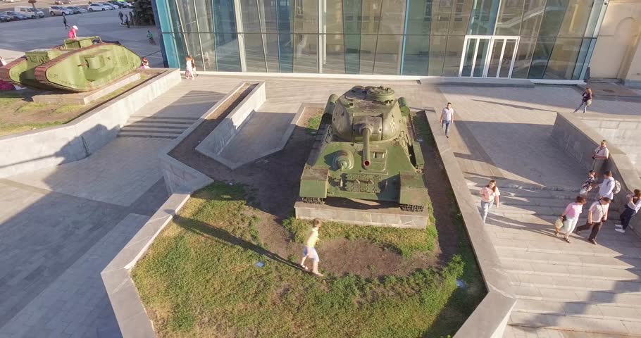 Historical Neighborhood. Near two tanks - English Mark I (Male) and Soviet T-34. The best tanks of the first and second world wars.