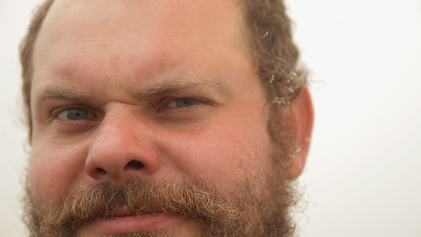 Portrait of an adult bearded man.