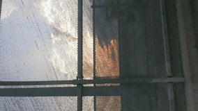 Vertical Video of Overpass Walkway from a Homeless Man's Perspective Watching a Sunset