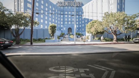 Los Angeles, California / United States - 08 07 2018: Los Angeles, California, August 2018 - Time lapse from inside a car of a Scientology building