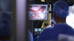 Medical robot. Robotic Surgery. Medical operation involving robot. Minimally Invasive Robotic Surgery with the da Vinci Surgical System - Stock Footage