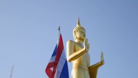 buddha statue gold color and thailand flag motion footage video clip