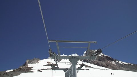 Chairlift tower and cable at volcano ski area