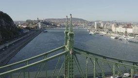 Aerial view of Liberty Bridge in Budapest, Hungary. 
Chain Bridge, Elisabeth Bridge, Castle Hill, Danube.
RAW 4K footage for creators (dlog, d log).
