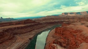 Aerial footage from high above the Colorado river in the Canyonlands National Park outside of Moab Utah