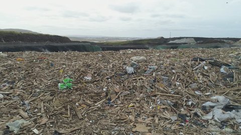 City dump landfill Pile of garbage plastic waste buried underground