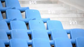 Sport arena tribune video with empty blue chairs