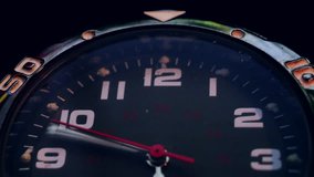macro close up of vintage wrist analog watch with hour and minutes arrows spinning like crazy. time management concept time lapse looped. dim light low key footage video