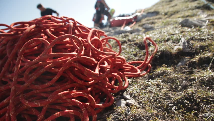 Climbing rope closeup. Equipment climbers in the mountains, steadicam shot.