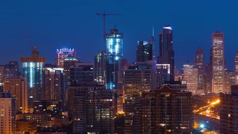 Sunrise time-lapse of the Downtown Chicago cityscape - night transitions to day