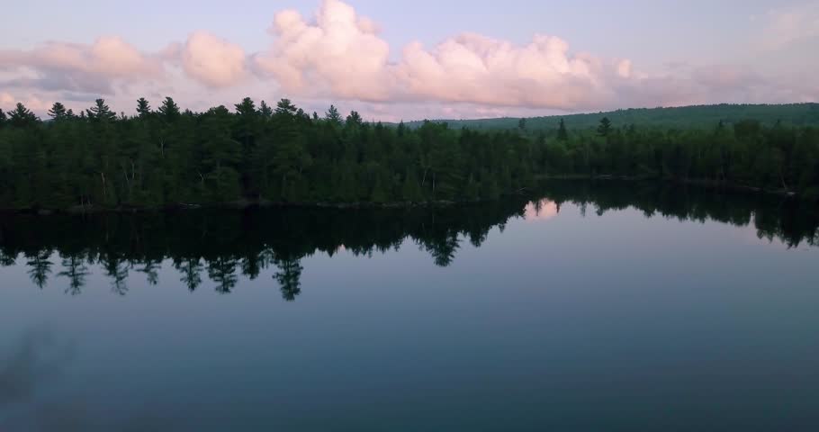 DRONE PULLBACK of Monson Pond at Sunset