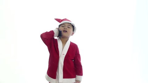 Asian little boy cell on telephone and white background,