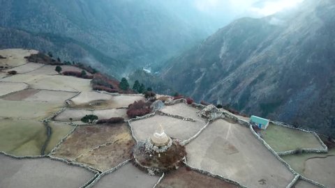 Aerial view of a stupa in Himalaya in a mountain village 
