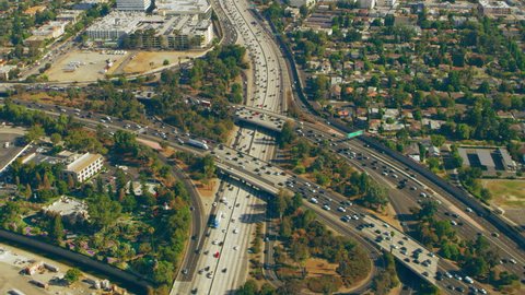 Aerial view of 405/101 interchange on a sunny day in Los Angeles, California. Shot on 4K RED camera.