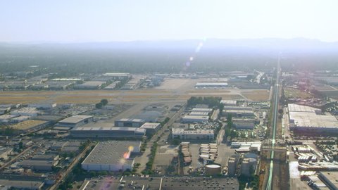 Aerial view at Van Nuys airport on a sunny day in Los Angeles, California. Shot on 4K RED camera.