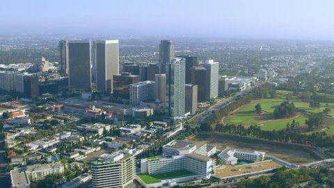 Aerial view in Beverly Hills area on a sunny day in Los Angeles, California. Shot on 4K RED camera.