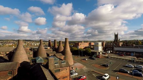 Aerial footage, view of the famous bottle kilns at Gladstone Pottery Museum in Stoke on Trent, Pottery manufacturing, industrial decline and vacant businesses Video 9 of 12