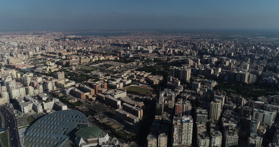 Aerial Drone shot over Egypt Alexandria city Bibliotheca Alexandrina