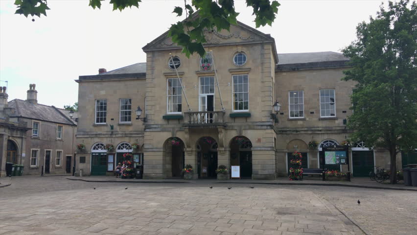 Camera slowly slides in front of Wells Town Hall in Somerset, United Kingdom