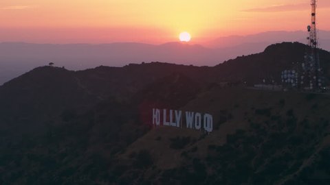 Los Angeles California CIRCA-2018. Flying in Los Angeles amongst The Hollywood Hills, Hollwyood sign and mountains. Wide shot on 4k RED camera. 