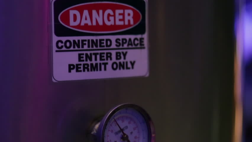 Danger confined space sign on metal | Shutterstock HD Video #1019017003