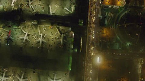 Aerial view of airport on a cloudy night in Los Angeles, California. Shot on 4K RED camera.
