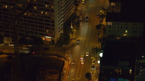 LA, California, USA, circa 2018: Aerial view of city billboards on a clear night in Los Angeles, California. Shot on 4K RED camera.