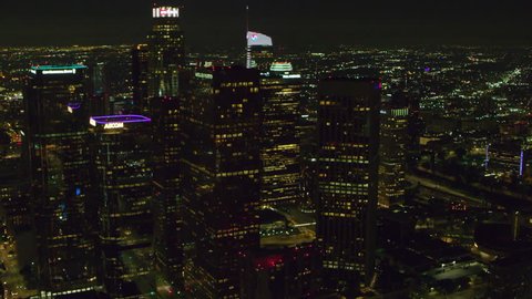 LA, California, USA, circa 2018: Aerial view of downtown city on a clear night in Los Angeles, California. Shot on 4K RED camera.