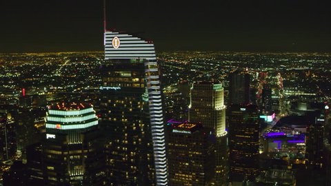 LA, California, USA, circa 2018: Aerial view of downtown city on a clear night in Los Angeles, California. Shot on 4K RED camera.