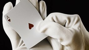 Heavy wave distortion fx: a glove-covered hand showing a playing card (ace of hearts). Moody, mysterious medium shot. Many takes.
 - Powered by Shutterstock - Get 15% off with code: PIKWIZARD15