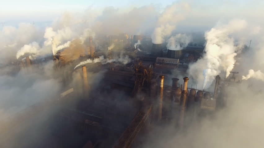 Aerial view. Pipes Throwing Smoke in the Sky. Large Plant on the Background of the City. Royalty-Free Stock Footage #1019031376