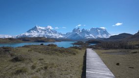 4k dolly shot of mountains and lake in Torres del Paine National Park in Chile