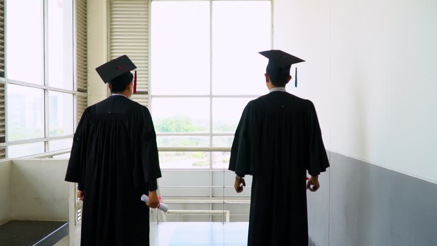 Graduates expressed joy in graduation. | Shutterstock HD Video #1019040475