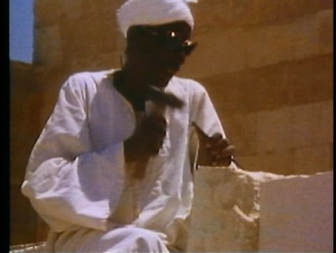 CAIRO, EGYPT, 1977, Egyptian temples restoration, man with chisel and block