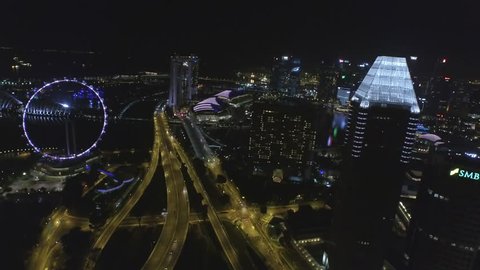 Singapore City Aerial Night View across Marina Bay and Sheares Bridge - Singapore 2016