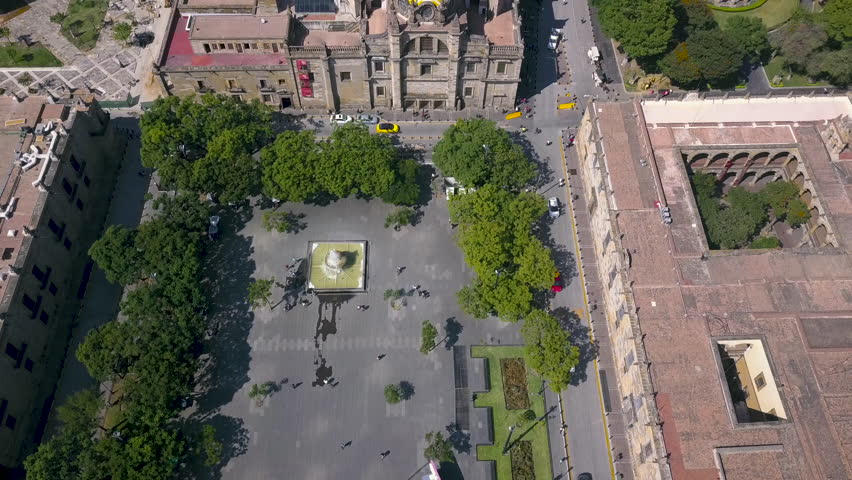 Plaza to Cathedral Reveal in Downtown, Centro, Guadalajara, Mexico Filmed with 4k Aerial Drone. Unique Wide Angle View From Above. Bird