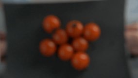Cherry tomatoes fly beautifully in slow motion