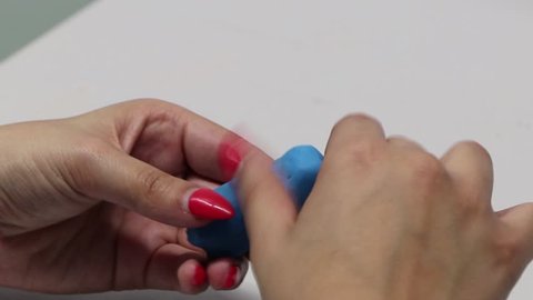Woman Playing with plasticine
