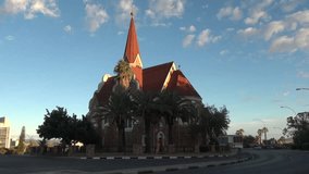 HD high quality summer day video footage of the 1910 Lutheran German-built Christuskirche Christ Church located on a hill near city center of Windhoek, the capital of Namibia, southern Africa
