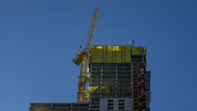 Time Lapse of Crane Construction of a Building