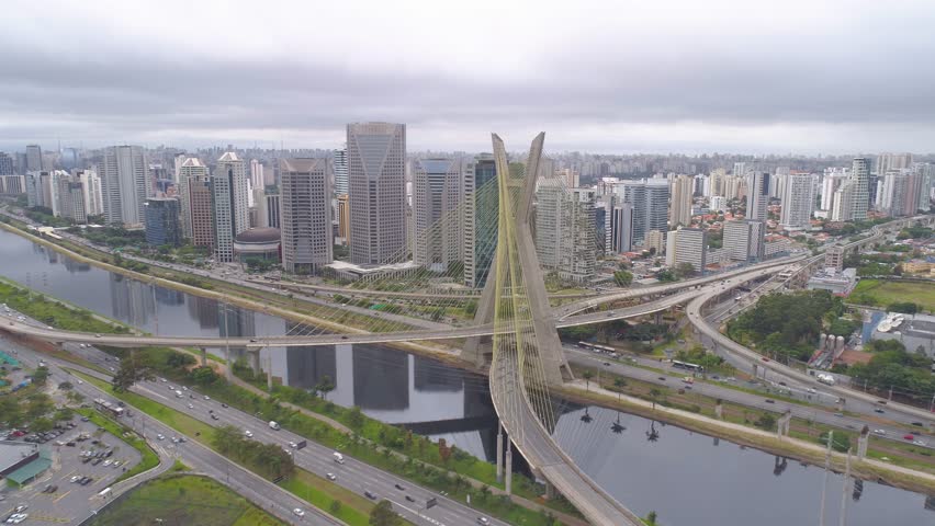 Aerial view of Octavio Frias de Oliveira Bridge, a landmark in Sao Paulo, the biggest city in Brazil. Drone shot in 4K