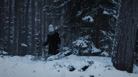 Woman with old lantern walking in snow covered wild forest in winter - Powered by Shutterstock - Get 15% off with code: PIKWIZARD15