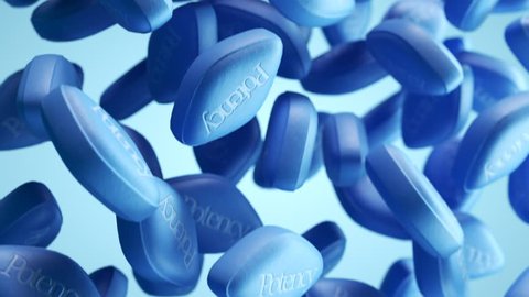 Countless blue pills falling down from the sky. Camera moving above them in a looping animation. Modern, contemporary and effective way of treating impotence. Symbol of sexual activity of the elderly
