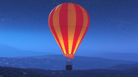 Colorful, glowing hot air balloons flying over the mountains during a night. Three large multi-colored vibrant balloons slowly rising against a dark sky with stars. Travel, adventure, festival.
